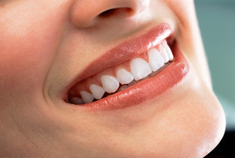 a-closeup-shot-of-a-smiling-woman-showing-her-clea-2026-01-11-08-37-43-utc (1)